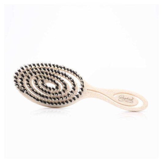 Raghad Organics Mixed Bristle Brush with natural and nylon bristles, designed for smooth, shiny, and frizz-free hair with an ergonomic handle.