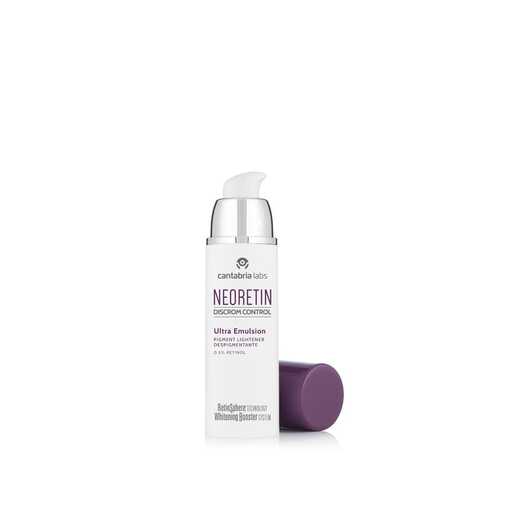 Close-up of Neoretin Ultra Emulsion bottle highlighting RetinSphere® and pollution protection for hyperpigmentation.
