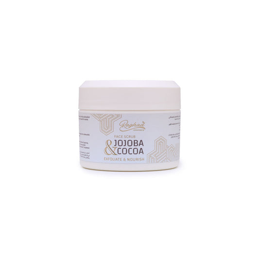 A jar of Raghad Organics Jojoba & Cocoa Scrub with natural ingredients, designed to exfoliate, hydrate, and brighten skin.