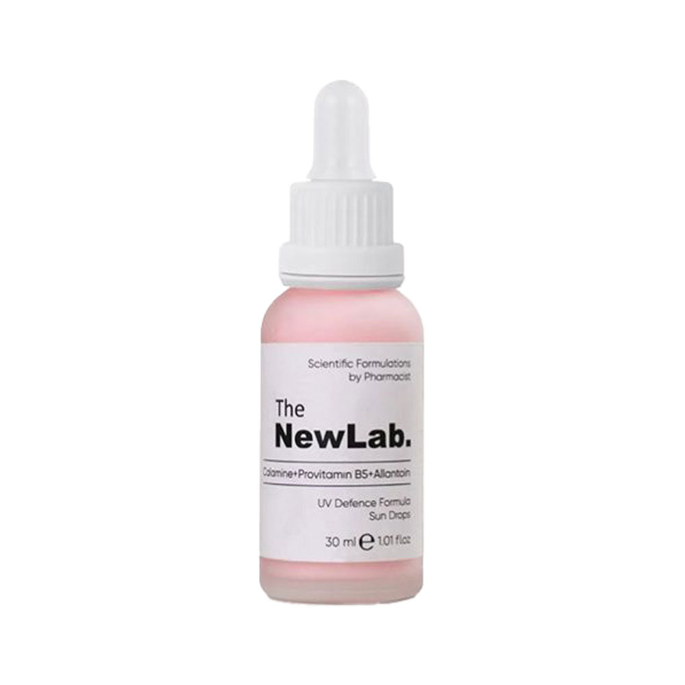 NewLab Calamine + Provitamin B5 + Allantoin UV Defence Formula Sun Drops SPF 50, 30ml bottle for sun protection and skin nourishment.