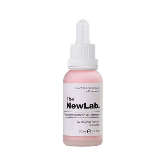 NewLab Calamine + Provitamin B5 + Allantoin UV Defence Formula Sun Drops SPF 50, 30ml bottle for sun protection and skin nourishment.