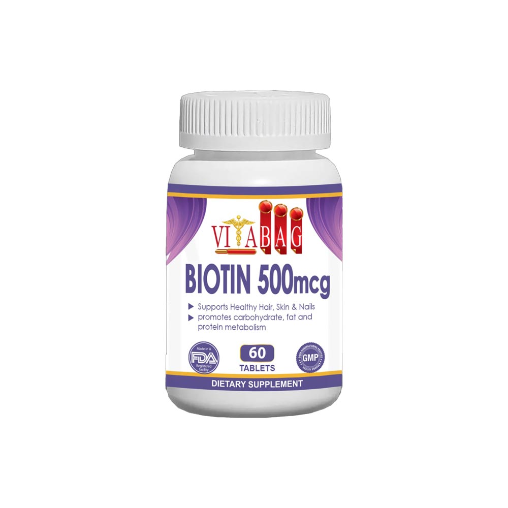 A bottle of Vitabag Biotin 500 mcg dietary supplement, with 60 tablets, labeled for skin, hair and nail health.